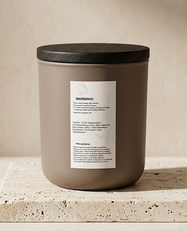 Back label of Sofia Dourvari Cuban Tobacco & Oak soy candle showing safety warnings and ingredient information